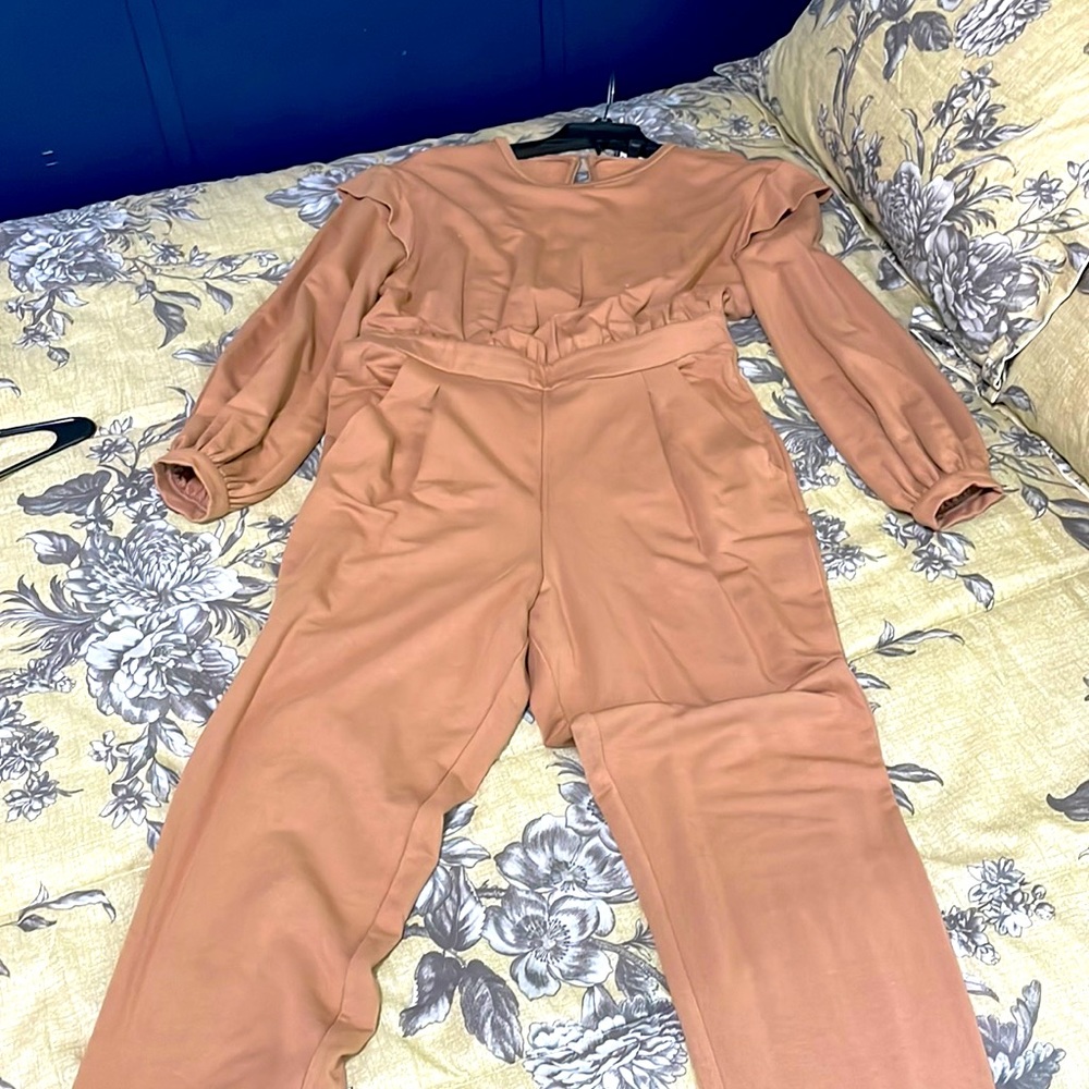 Express jumpsuit. Soft, no rips no stains.